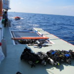 Prepping for a dive in Tubbataha on M/Y Sakura